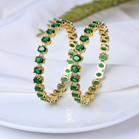 Stunning Brass Bangle with Green CZ Stones for a Touch of Elegance