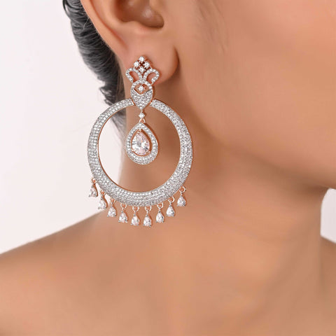 The Power of Sparkle: Designer CZ Drop White Earrings to Enhance Your Look