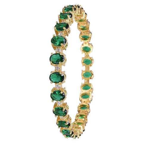 Stunning Brass Bangle with Green CZ Stones for a Touch of Elegance